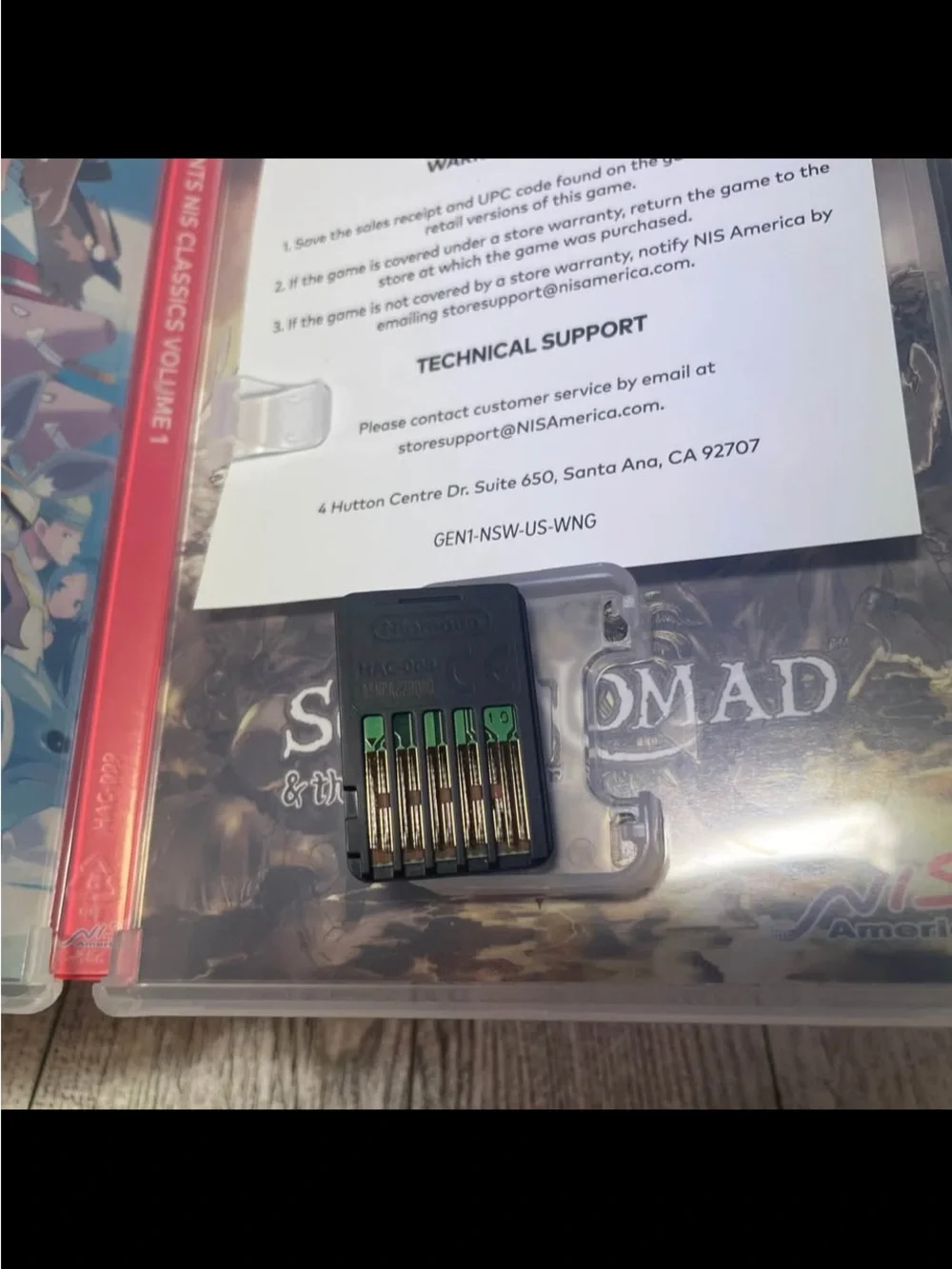 Nintendo Switch game card with black and green contacts